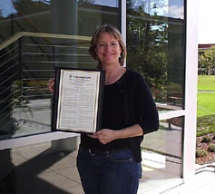 (Photo - Martha Siegel with Congressional record)