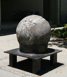 (Photo - the rock on its stand in front of SLAC Building 41)