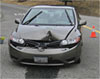 (Photo - smashed car)