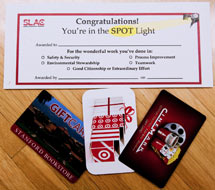 (Photo - Spot Award certificate and gift cards)